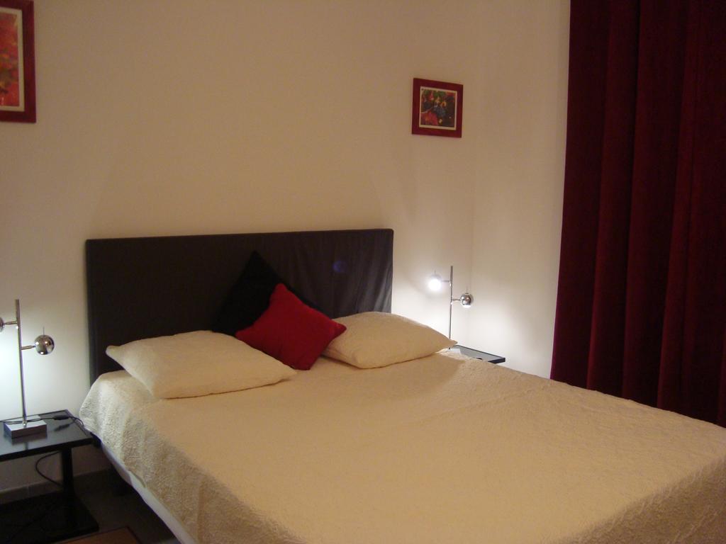 Chambres D'Hotes Les Palmiers De La Cite Carcassonne Rom bilde
